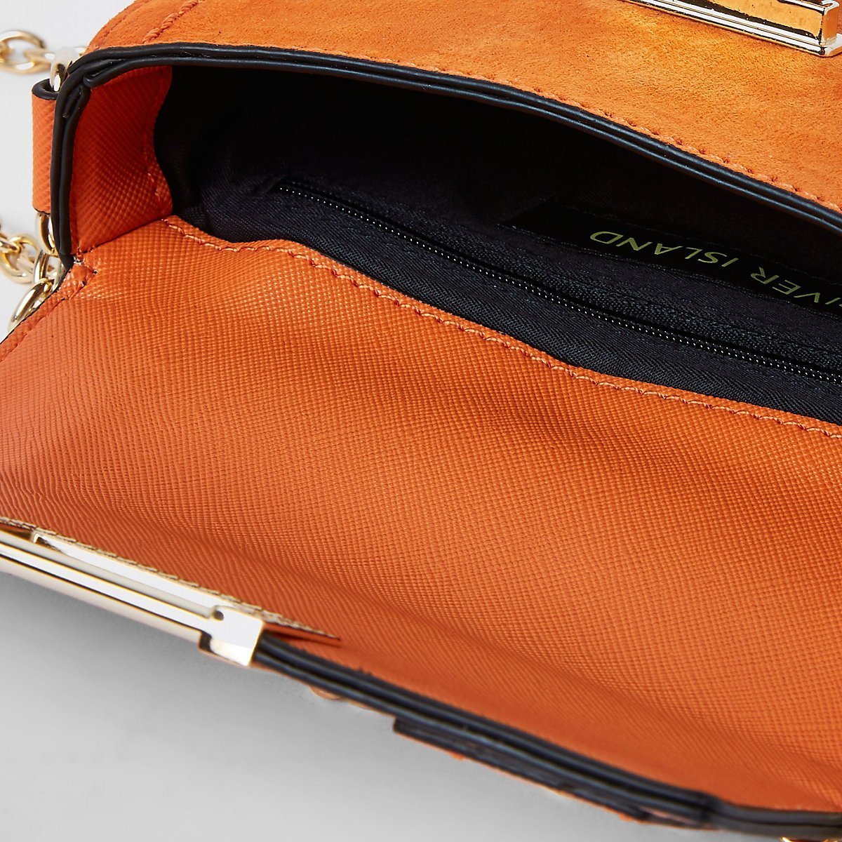 Orange saddle lock front chain cross body bag