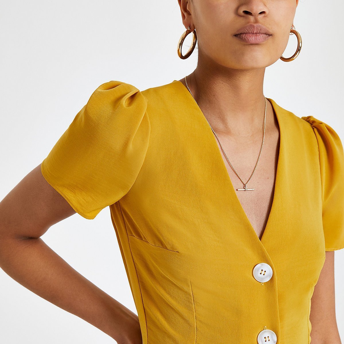 Yellow button front tea top